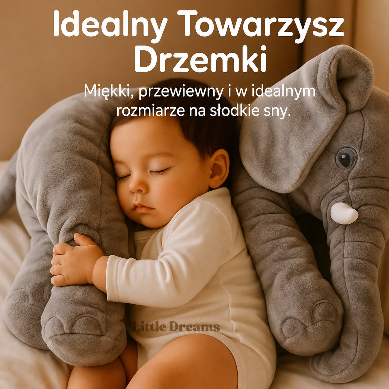 Niemowlę leżące na poduszce słonia podczas ćwiczeń na brzuszku