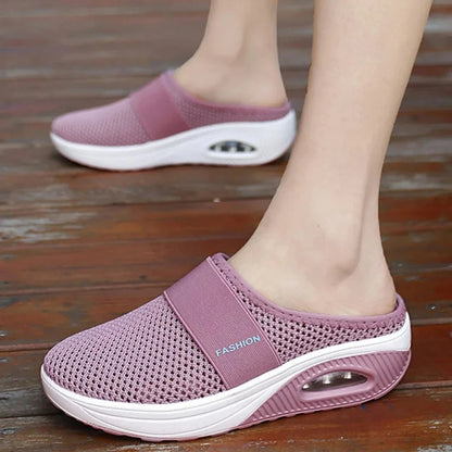 OrthoAir™ w różowym kolorze z boku, pokazujące nowoczesny minimalistyczny design