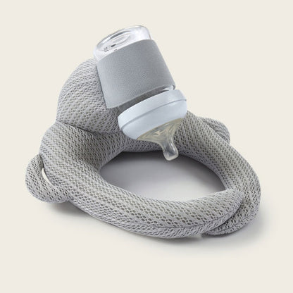 Poduszka do butelki w kolorze niebieskim z motywem dla niemowląt
